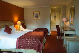 Отель The Newgrange Hotel Ан-Уавь Трехместный номер-1